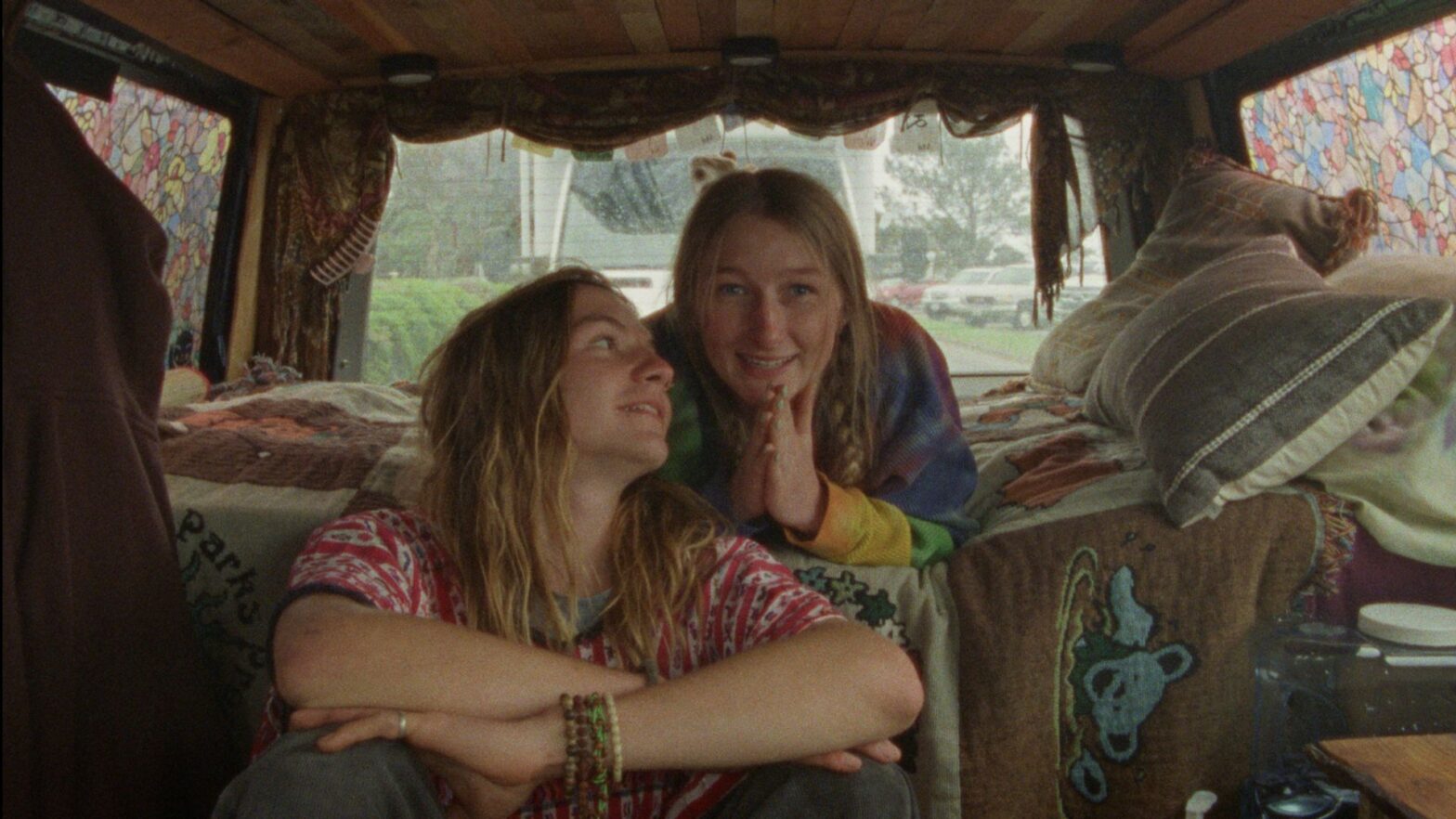 Summer Tour promotional still: two women inside a camper.